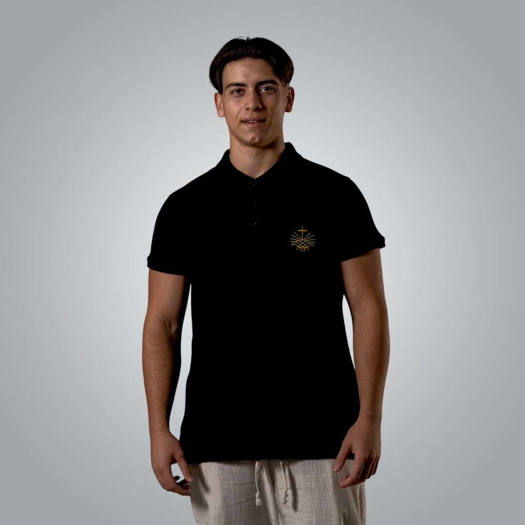Black polo shirt with gold embroidered Loom in Light logo on the chest