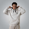Front view of men’s white hoodie with black embroidered cross emblem