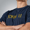 Close up of gold embroidered John 1:1 on navy men’s Christian t shirt