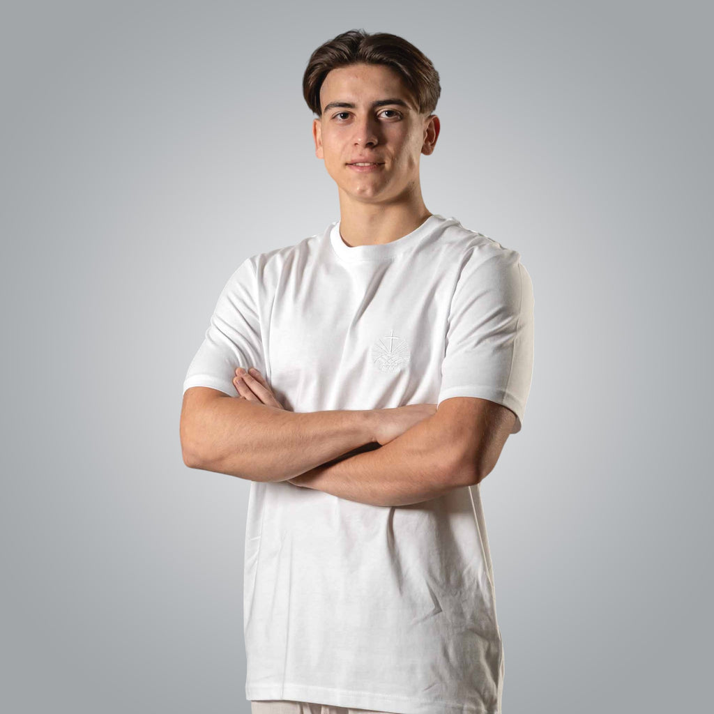 Front view of man in white Christian t shirt with tone on tone embroidered chest logo