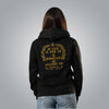 Back of women’s black hoodie with gold embroidered Romans 8:31 verse If God is for us who can be against us