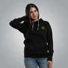Front view of black women’s Christian hoodie with gold embroidered cross emblem