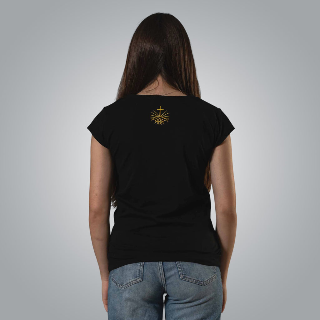 Back view of woman wearing black V neck Christian t shirt with gold embroidered Loom in Light emblem
